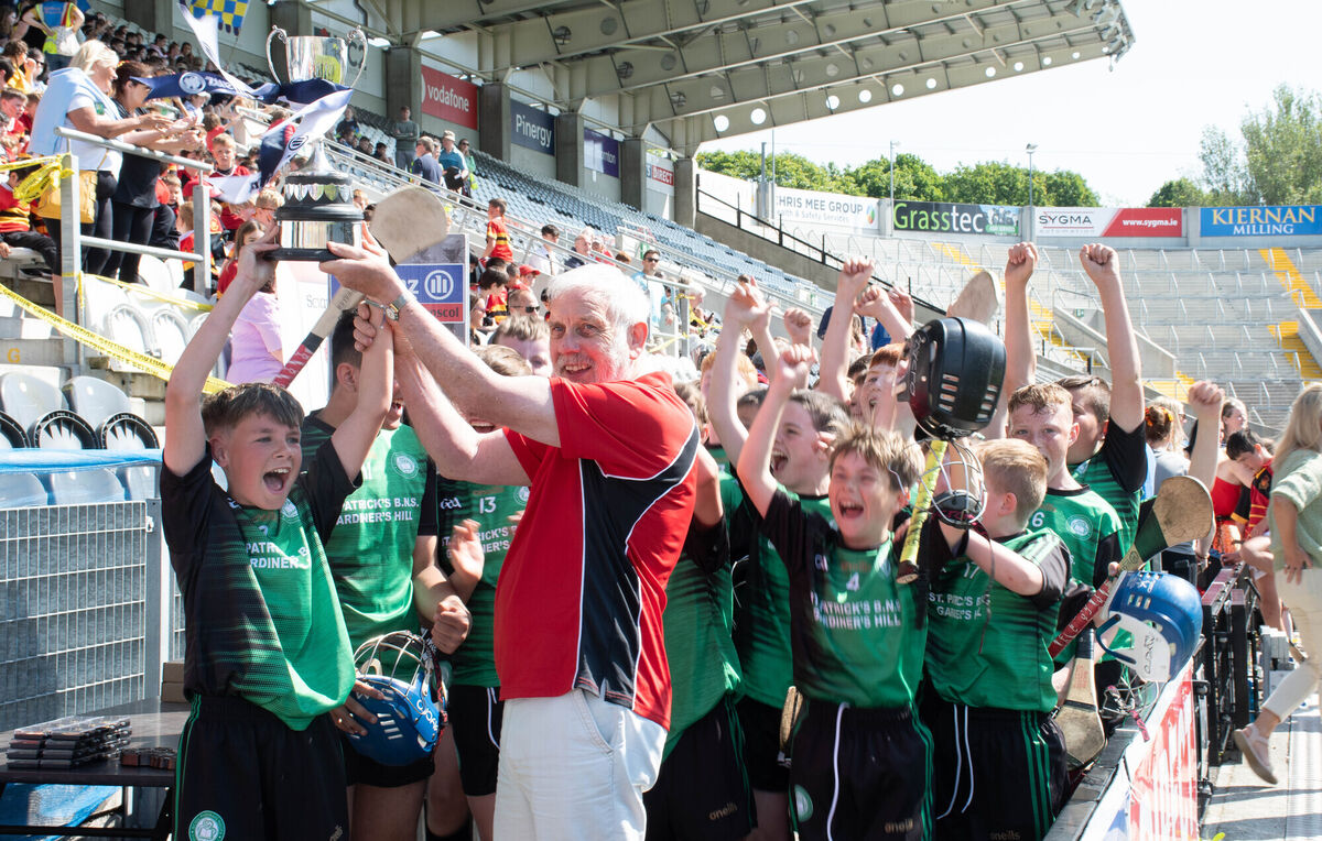 Patsy Foley, Chief Steward, presents the trophy to St Patricks Gardiners Hill captain Camryn MacBride. Picture: Howard Crowdy Patsy Foley, Chief Steward, presents the trophy to St Patricks Gardiners Hill captain Camryn MacBride. Picture: Howard Crowdy