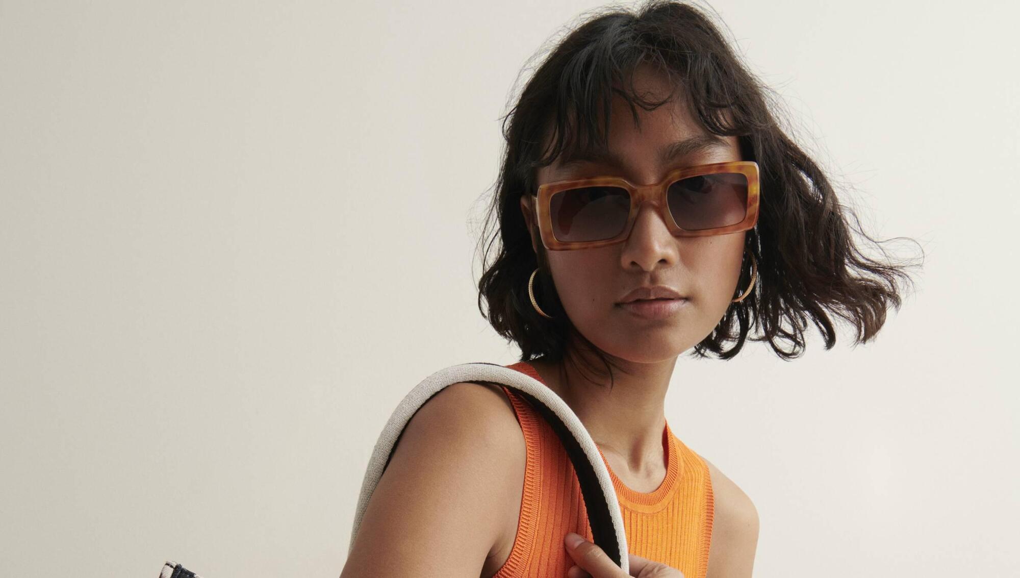 M&S Collection ribbed sleeveless top, €39, tote bag, €54, sunglasses, €20, M&S