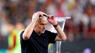 Roma manager Jose Mourinho removes his runner up medal after losing the UEFA Europa League Final at the Puskas Arena, Budapest. Picture date: Wednesday May 31, 2023.