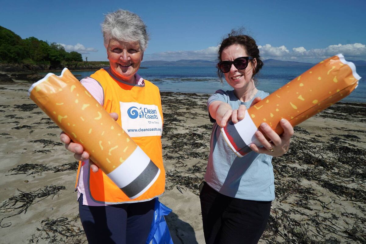 Clean Coasts is asking people to dispose of their smoking-related litter correctly to protect our environment and marine life. In the picture: Clean Coasts Officer Olivia Jones and Keep Our Beaches Clean volunteer Mairead Staunton. Courtesy of CleanCoasts  