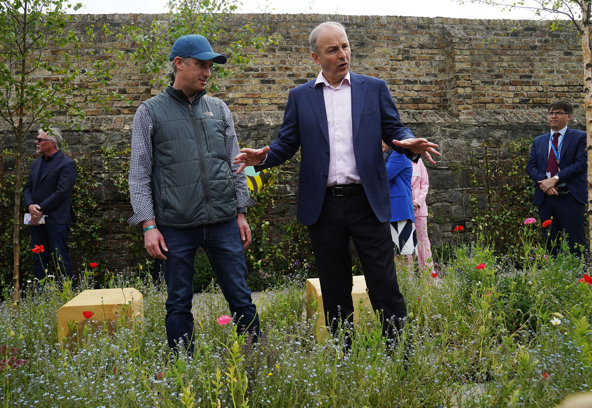 Tánaiste Micheál Martin   with landscape architect Dáibhí Mac Domhnaill in the Green Cities Europe Parklet at Bloom which continues until Monday. Picture: Brian Lawless/PA