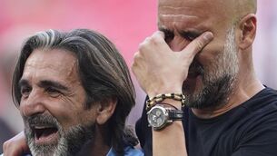 <p>LET IT OUT: Manchester City's head coach Pep Guardiola is emotional after the victory. Picture: AP Photo/Dave Thompson</p>
