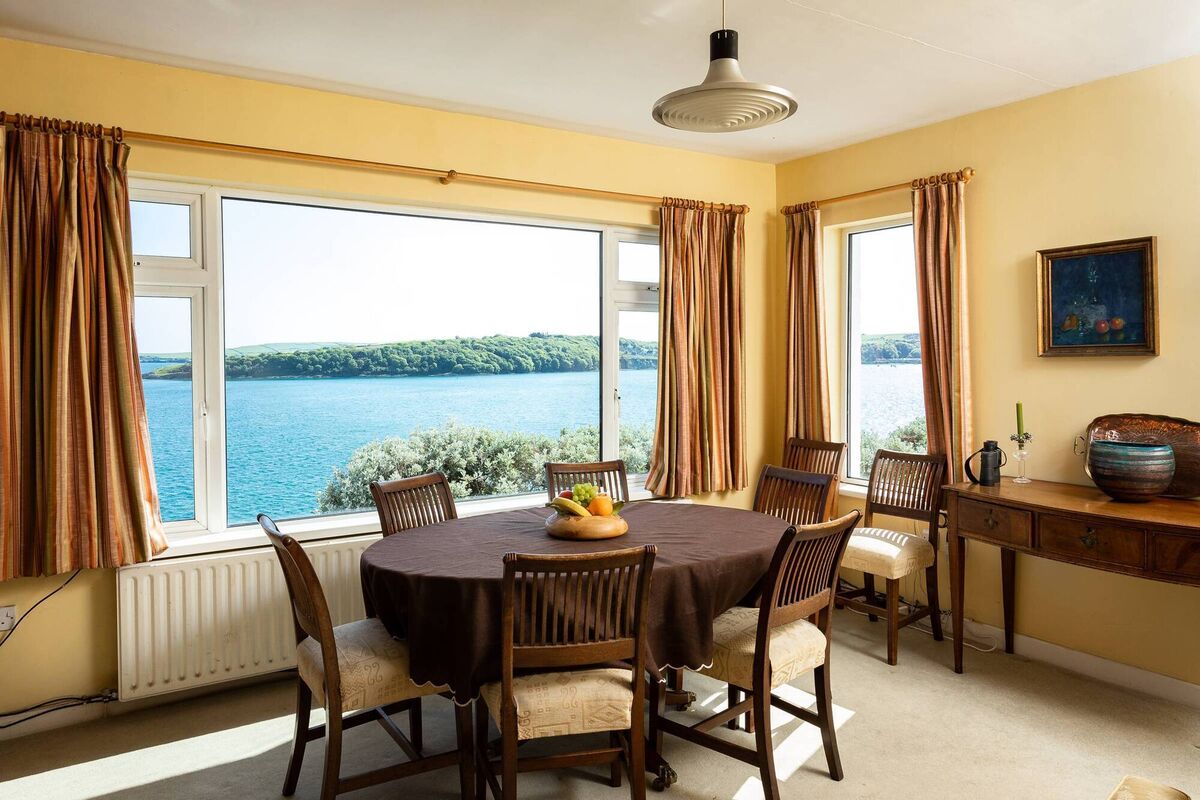 Dine on the views at this double aspect dining room Dine on the views at this double aspect dining room