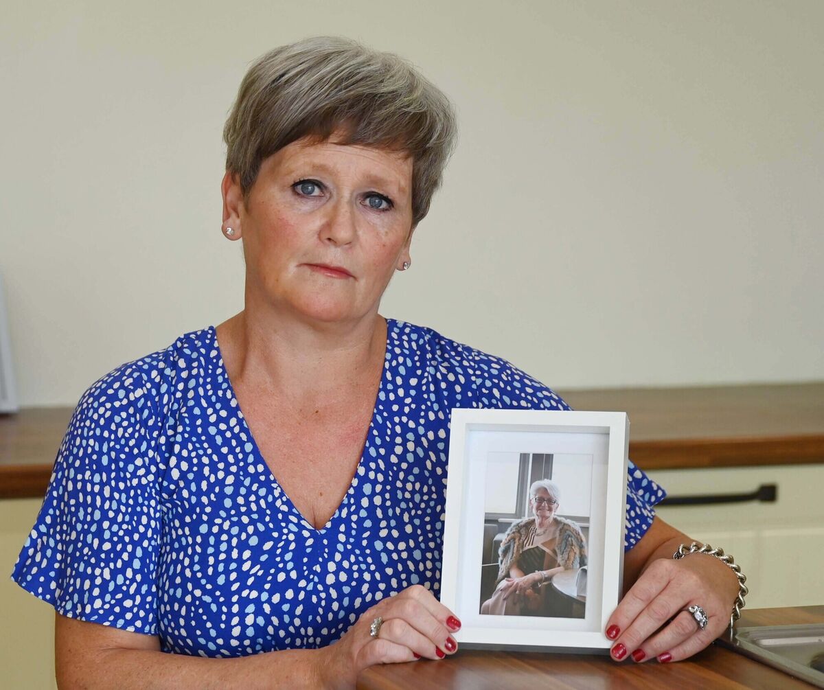 Allison McCarthy with a photograph of her mother Alice: 'They’ve said now my mother was alone when she died, they have. I live four minutes away.' Picture: Denis Minihane