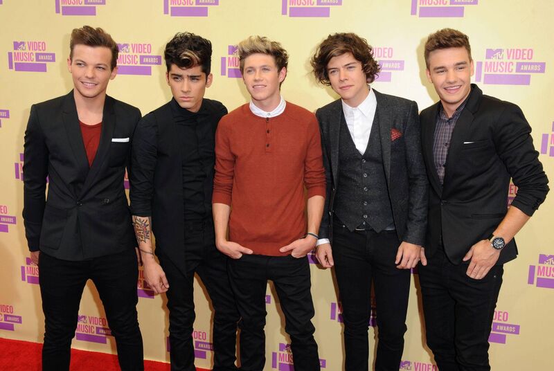 Harry Styles still usually plays a couple of One Direction songs. Picture: PA Wire Harry Styles still usually plays a couple of One Direction songs. Picture: PA Wire