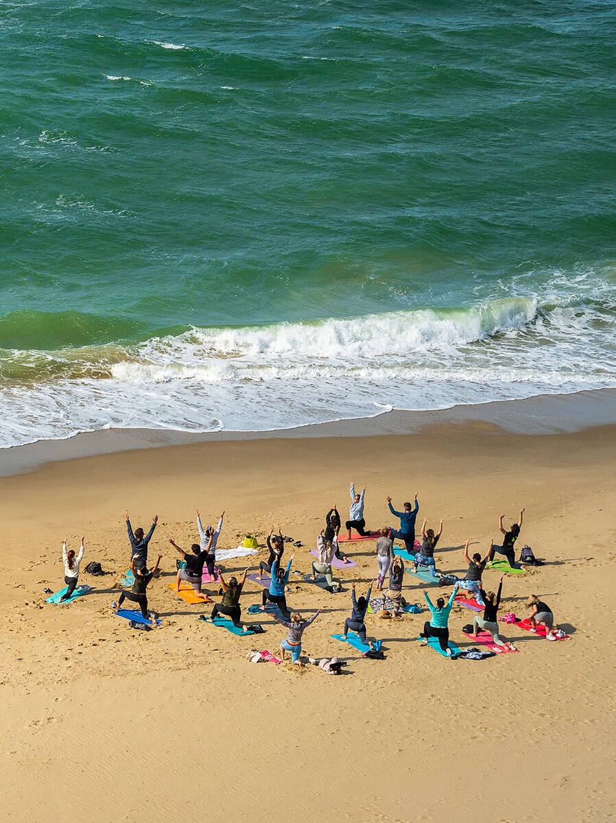 Experience breathwork and yoga on the beach