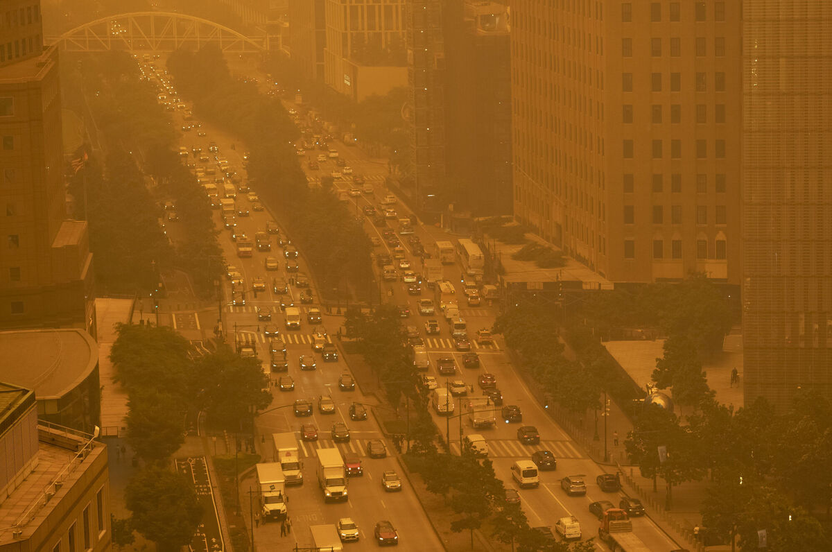 Traffic moves along Wednesday, June 7, 2023, in New York, amidst smokey haze from wildfires in Canada. Smoke from Canadian wildfires poured into the US East Coast and Midwest on Wednesday, covering the capitals of both nations in an unhealthy haze, holding up flights at major airports and prompting people to fish out pandemic-era face masks. Picture: AP Photo/Andy Bao Traffic moves along Wednesday, June 7, 2023, in New York, amidst smokey haze from wildfires in Canada. Smoke from Canadian wildfires poured into the US East Coast and Midwest on Wednesday, covering the capitals of both nations in an unhealthy haze, holding up flights at major airports and prompting people to fish out pandemic-era face masks. Picture: AP Photo/Andy Bao
