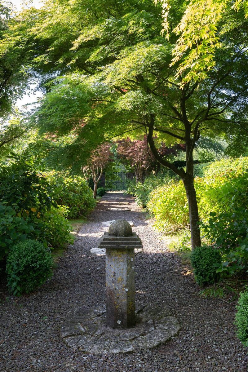 Formal, and beautiful, both house and grounds have great bones