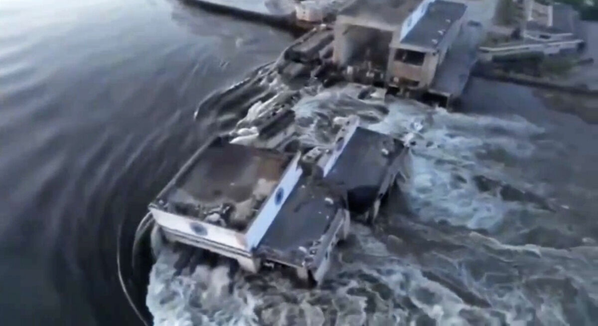 In this image taken from video released by the Ukrainian Presidential Office, water runs through a breakthrough in the Kakhovka dam in Kakhovka, Ukraine, Tuesday, June 6, 2023. In this image taken from video released by the Ukrainian Presidential Office, water runs through a breakthrough in the Kakhovka dam in Kakhovka, Ukraine, Tuesday, June 6, 2023.