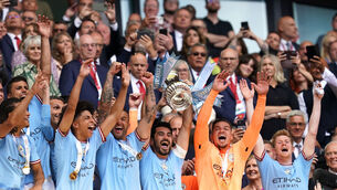 <p>THE NORM: Manchester City's Ilkay Gundogan lifts the Emirates FA Cup. Pic: Nick Potts/PA Wire.</p>