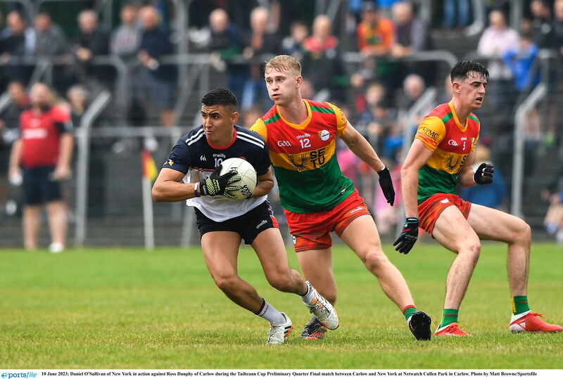 Daniel O'Sullivan of New York in action against Ross Dunphy of Carlow. Daniel O'Sullivan of New York in action against Ross Dunphy of Carlow.