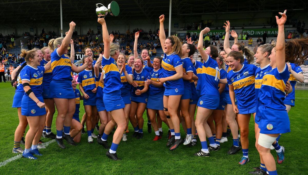 Tipperary players join with Mairead Eviston as she celebrates with the cup after the Munster Senior Camogie Championship Final. Photo by Ray McManus/Sportsfile Tipperary players join with Mairead Eviston as she celebrates with the cup after the Munster Senior Camogie Championship Final. Photo by Ray McManus/Sportsfile