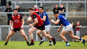 <p>ON THE BURST: Odhran Murdock of Down in action against Dylan Farrell of Longford during the Tailteann Cup preliminary quarter-final at Pairc Esler in Newry. Pic: Daire Brennan/Sportsfile</p>