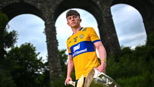 <p>'HEAT OF THE MOMENT': Adam Hogan of Clare poses for a portrait with the Liam MacCarthy cup at the 2023 GAA Hurling All-Ireland Series national launch at Kilmacthomas Viaduct in Waterford. Pic: Brendan Moran/Sportsfile</p>