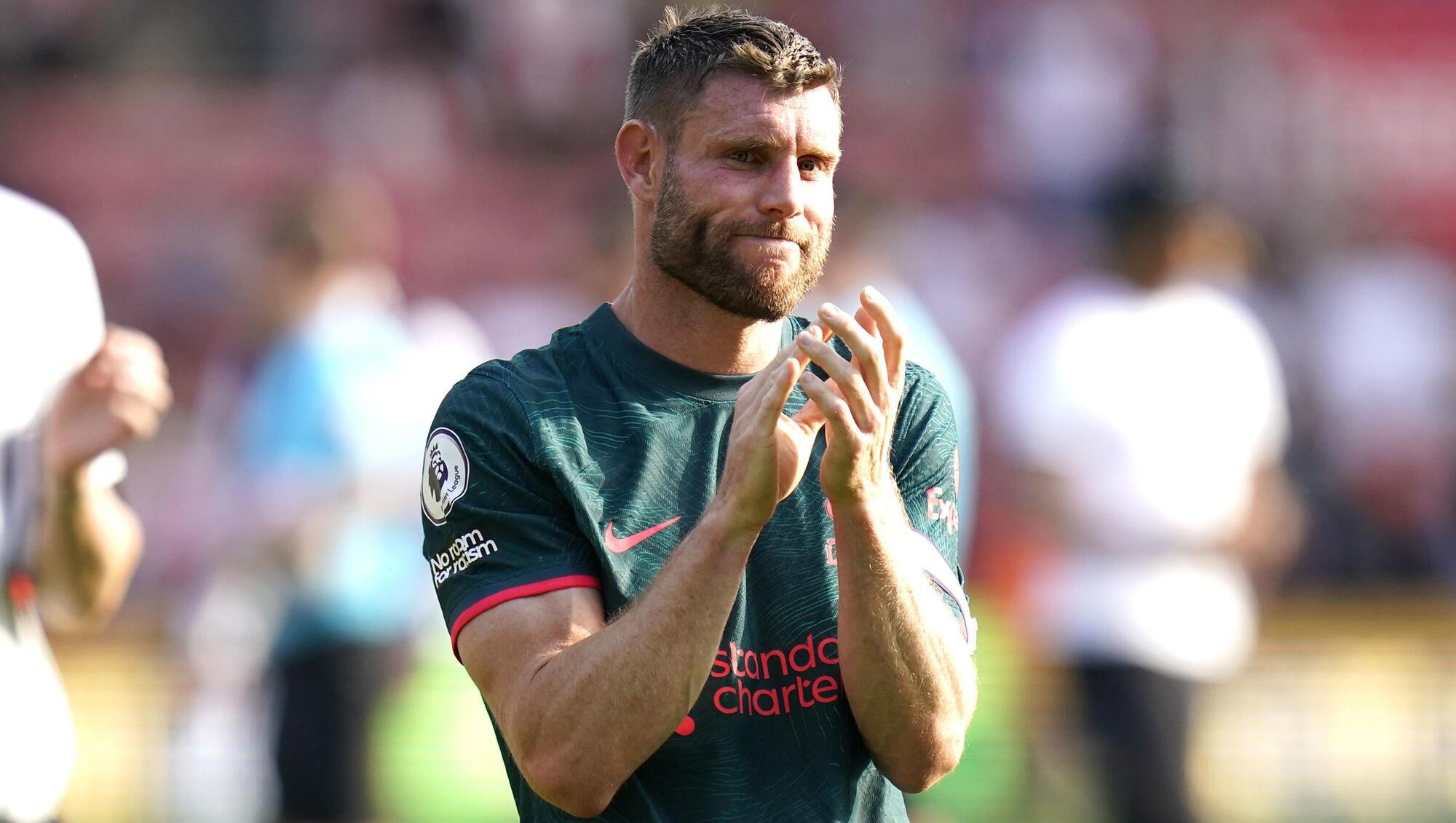 ON THE MOVE: James Milner applauds Liverpool fans after his final game for the club. Brighton have announced his signing. Pic: Andrew Matthews/PA Wire