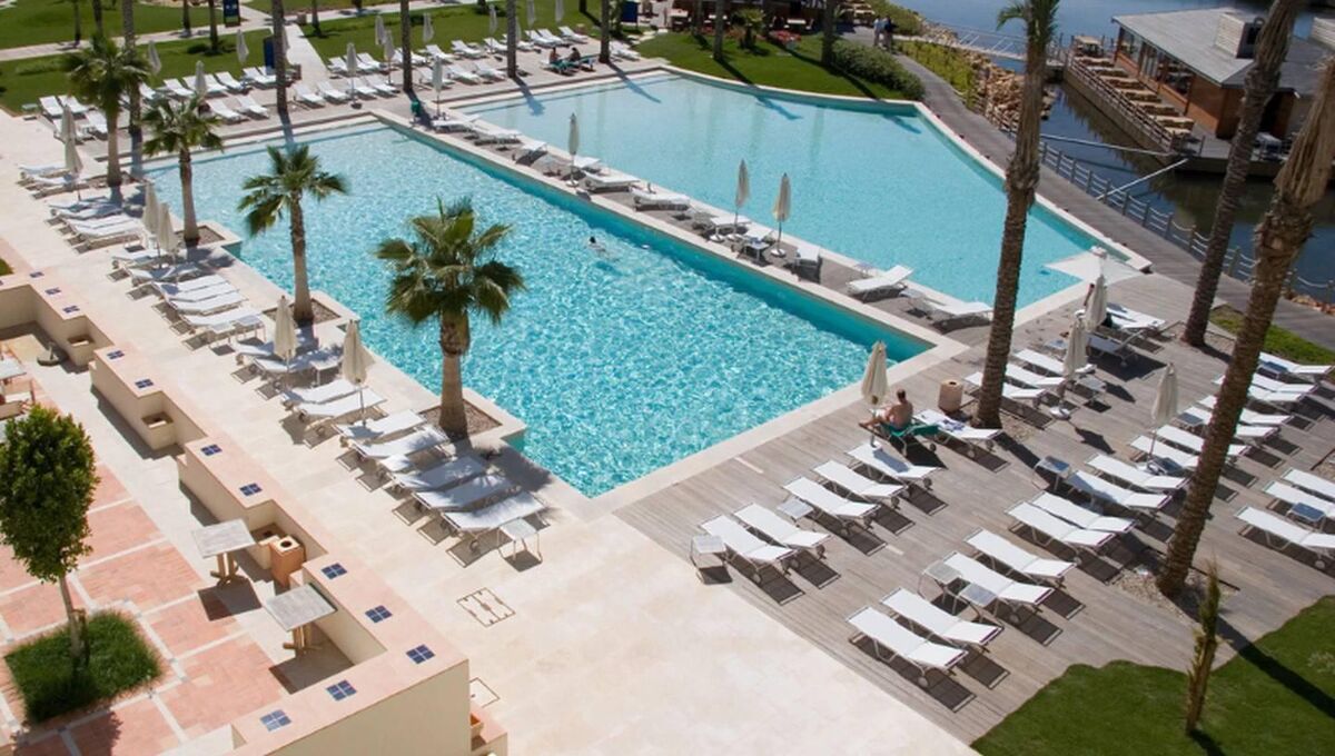 Experience lakeside relaxation at Domes Lake Algarve.