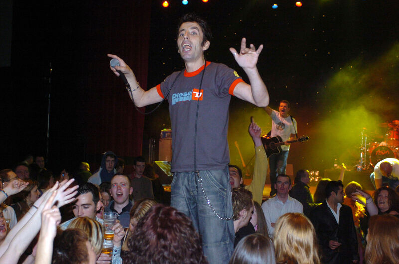 Christy Dignam entertains the crowd at the INEC Killarney in 2004. Christy Dignam entertains the crowd at the INEC Killarney in 2004.