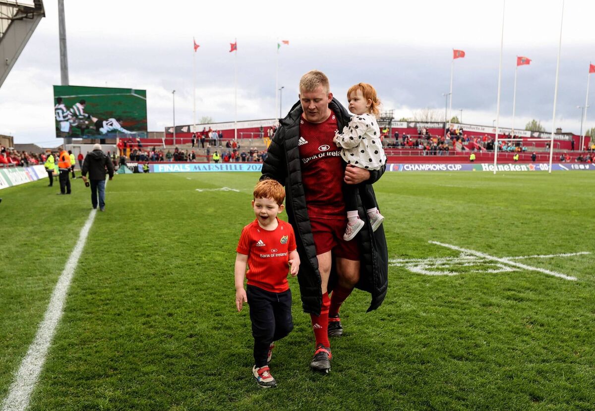 Munster's John Ryan celebrates after a 2022 game with his son Felix and daughter Gaia. Pic: INPHO/Dan Sheridan