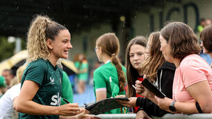 <p>ON A JOURNEY: Leanne Kiernan signs autographs for fans after the training. Pic: ©INPHO/Ben Brady</p>
