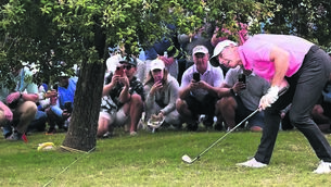 <p class="contextmenu internal_Caption">
                <span class="contextmenu emphasis textWhite">TREE-MENDOUS: Rory McIlroy plays his second shot on the 13th hole during the second round of the US Open at Los Angeles Country Club. 	Picture: Ross Kinnaird/Getty Images</span>
            </p>