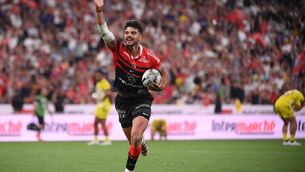 <p>Toulouse's French fly-half Theo Ntamack celebrates after scoring a try during the French Top14 rugby union final match between Stade Toulousain Rugby (Toulouse) and Stade Rochelais (La Rochelle) at the Stade de France</p>