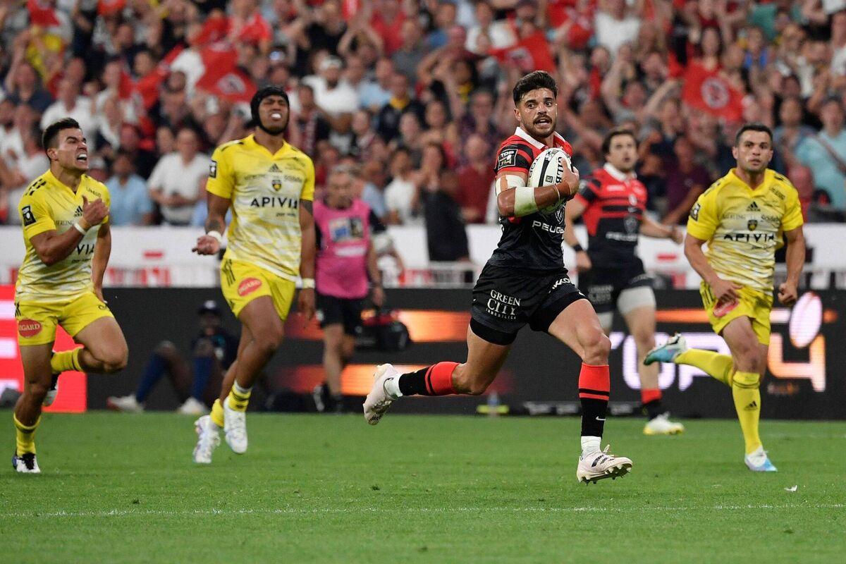 ON HIS BIKE: Toulouse fly-half Romain Ntamack runs in to score the last-gasp try at the Stade de France