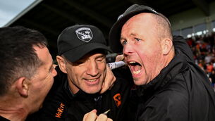 <p>PERFECT TIMING: Armagh manager Kieran McGeeney, centre, and selector Ciaran McKeever. Pic: Harry Murphy/Sportsfile</p>