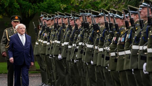 <p>President Michael D Higgins inspects a guard of honour during a state religious ceremony to commemorate the 1916 Easter Rising leaders at Arbour Hill Cemetery in Dublin. Picture: Brian Lawless/PA</p>