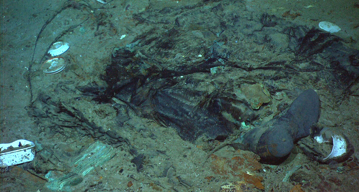This 2004 photo provided by the Institute for Exploration, Center for Archaeological Oceanography/University of Rhode Island/NOAA Office of Ocean Exploration, shows the remains of a coat and boots in the mud on the sea bed near the Titanic's stern. File photo: Institute for Exploration, Center for Archaeological Oceanography/University of Rhode Island/NOAA Office of Ocean Exploration, File