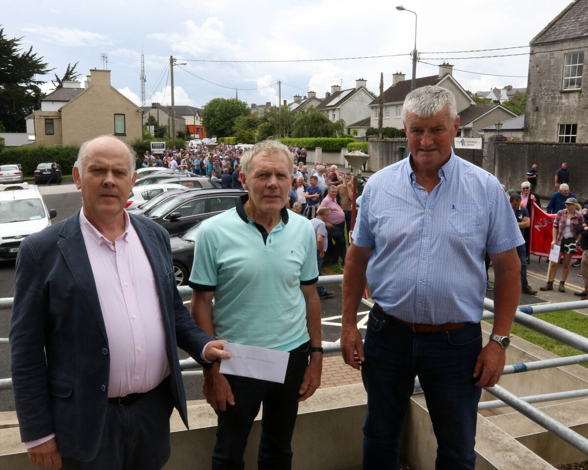 Seamus Crawford, Gerard Quain and Michael O'Flynn, arriving to Kerry Group offices with a letter in Charleville. Picture: Brendan Gleeson