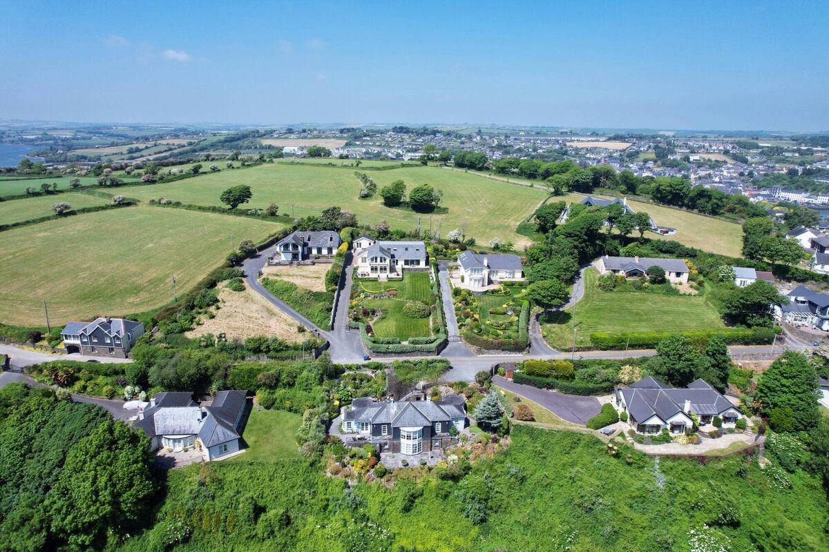 Joaney's Garden is by the top of Compass Hill: the land at Constantia Farm where €10m has been spent is behind, on the crown of the hill with the modern house almost hidden by trees Joaney's Garden is by the top of Compass Hill: the land at Constantia Farm where €10m has been spent is behind, on the crown of the hill with the modern house almost hidden by trees