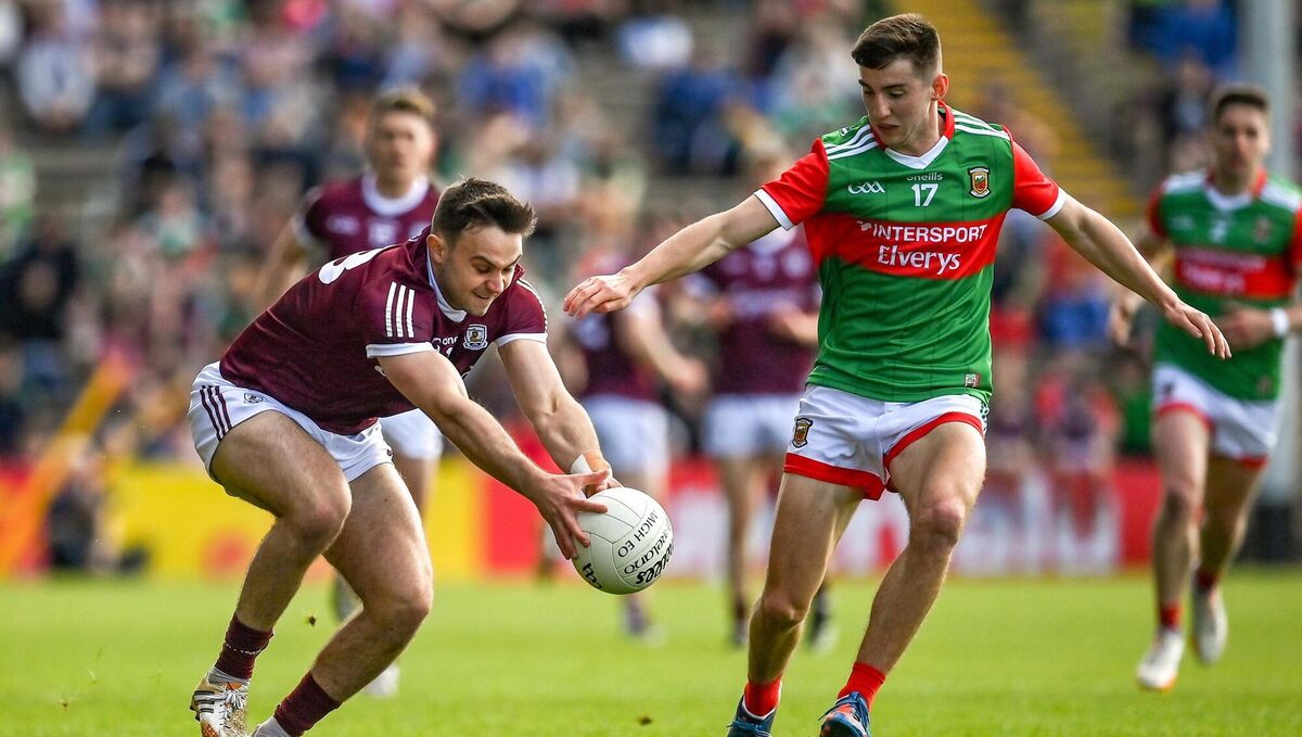 AGE OLD RIVALRY: Cillian McDaid of Galway gets to the ball ahead of Enda Hession of Mayo during the Connacht GAA Football Senior Championship Quarter-Final match between Mayo and Galway at Hastings Insurance MacHale Park in Castlebar, Mayo. Pic: Brendan Moran/Sportsfile