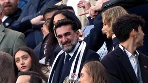 <p>AMBITIOUS: Newcastle United chairman Yasir Al-Rumayyan (centre). Pic: PA</p>