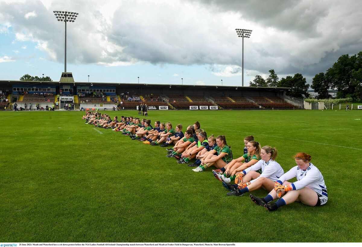PROTEST: Meath and Waterford have a sit down protest before the TG4 Ladies Football All-Ireland Championship match joining their colleagues from around the country who protested over the weekend. Pic: Matt Browne/Sportsfile 
