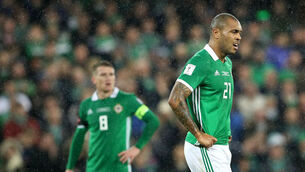 Josh Magennis dejected after conceding their first goal 9/11/2017