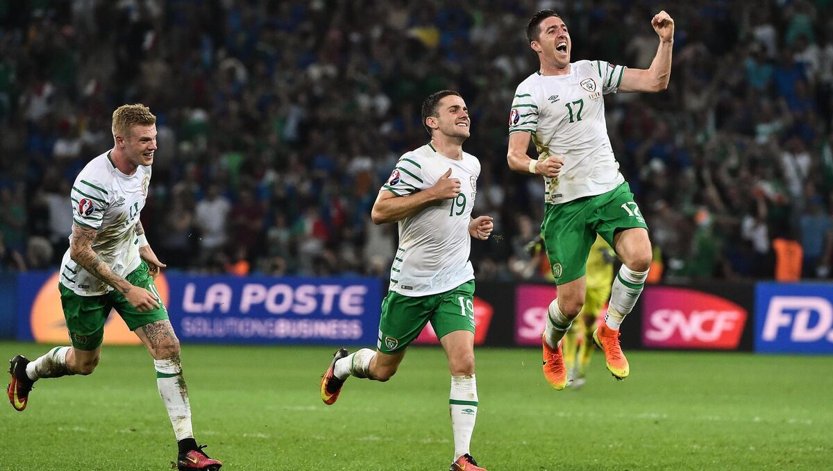 James McClean, Robbie Brady and Stephen Ward celebrate after Ireland's win over Italy in Lille. Photo by David Maher / Sportsfile