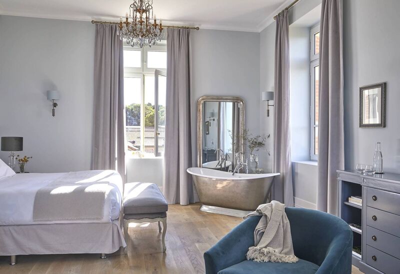 A bedroom at Château Capitoul