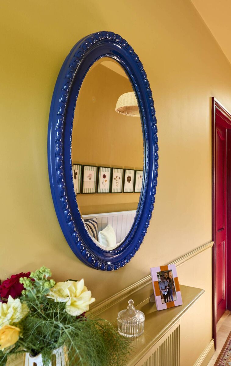 Elaine’s bold use of colour also comes through in the accessories throughout the hallway.