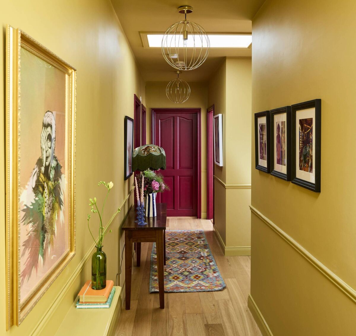 Lots of little touches bring the hallway to life, including a painting of one of Elaine’s heroes, Iris Apfel.