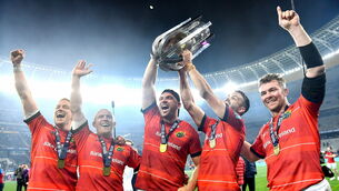 <p>URC CHAMPS: Munster players, from left, Mike Haley, Keith Earls, Tadhg Beirne, Conor Murray and captain Peter O'Mahony celebrate with the trophy after the United Rugby Championship Final match between DHL Stormers and Munster at DHL Stadium in Cape Town, South Africa. Pic: Ashley Vlotman/Sportsfile</p>