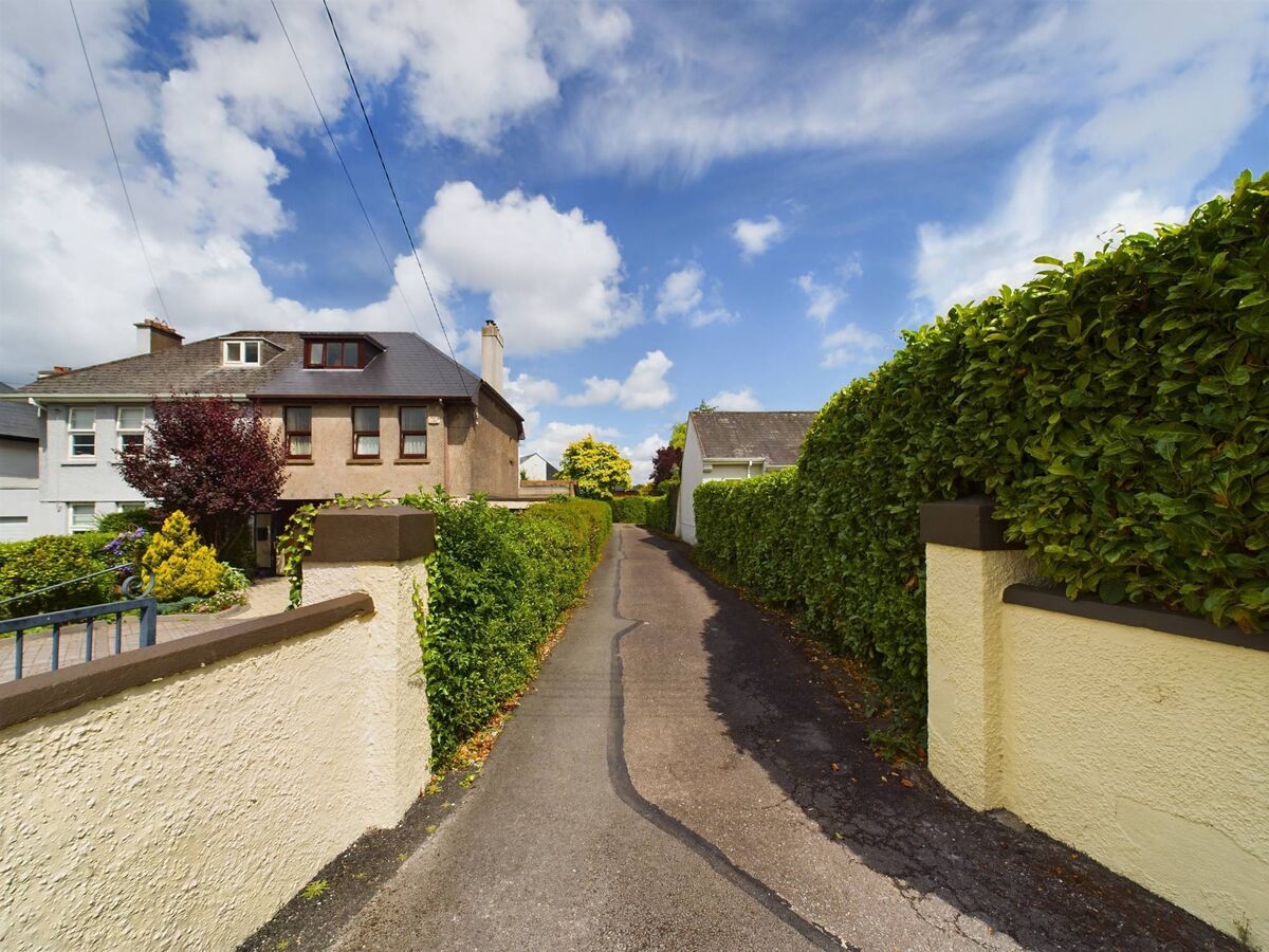 Entrance to Little Orchard along Farranlea Road: the house itself is out of sight at the very end Entrance to Little Orchard along Farranlea Road: the house itself is out of sight at the very end