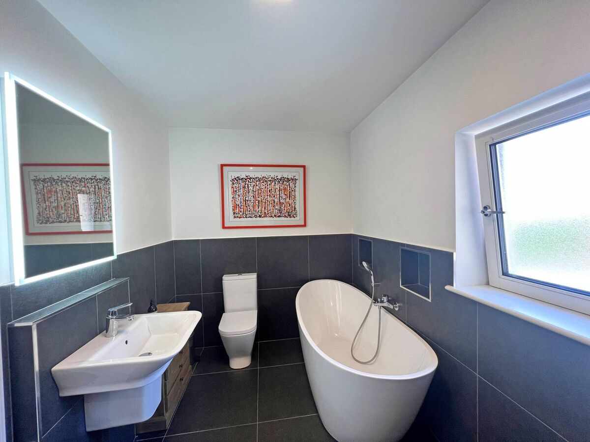 One of the several reworked bathrooms One of the several reworked bathrooms