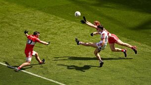 <p>FULL STRETCH: Chris Óg Jones of Cork in action against Benny Heron and Conor Glass of Derry during the All-Ireland SFC quarter-final at Croke Park. Pic: Brendan Moran/Sportsfile</p>
