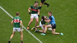 <p>DUBLIN GET A GRIP: Diarmuid O’Connor of Mayo and Con O'Callaghan of Dublin tussle. Photo by Brendan Moran/Sportsfile</p>