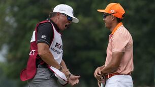 <p>DROUGHT OVER: Rickie Fowler of the United States and his caddie, Ricky Romano, celebrate on the 18th green after defeating Adam Hadwin of Canada and Collin Morikawa of the United States in a play-off to win the Rocket Mortgage Classic at Detroit Golf Club in Detroit, Michigan. Pic: Raj Mehta/Getty Images</p>