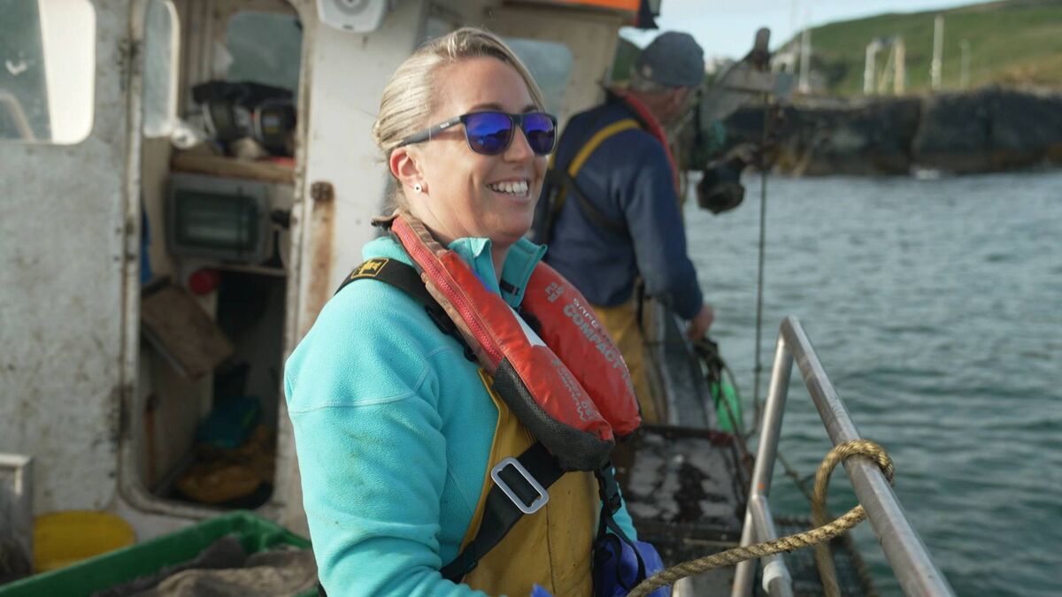 Niamh Ní Dhrisceoil and her father Pádraig on their lobster boat Niamh Ní Dhrisceoil and her father Pádraig on their lobster boat