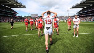 <p>DEJECTED: Cork's Eoghan McSweeney dejected after the defeat to Derry. Pic: INPHO/Evan Treacy</p>