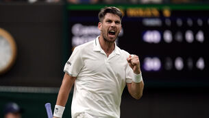 Cameron Norrie celebrates beating Tomas Machac (Victoria Jones/PA)