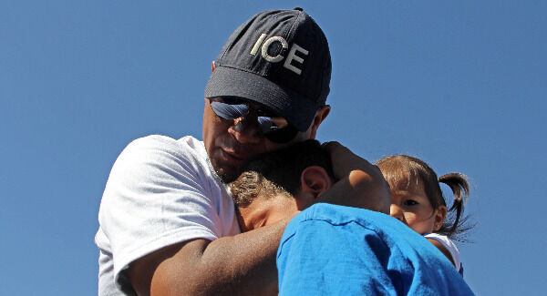 Ivan Castaneda, a former Mexican soldier deported from the US, embraces his children at the bank of the Rio Grande during the event called ‘Abrazos No Muros’ (Hugs, Not Walls) promoted by the Border Network of Human Rights organisation. Castaneda was denied the political asylum he requested in 2012 to flee violence in his native Ciudad Juarez, while his wife, mother and five children remain in Denver, Colorado, US. Picture: Herika Martinez/AFP/Getty