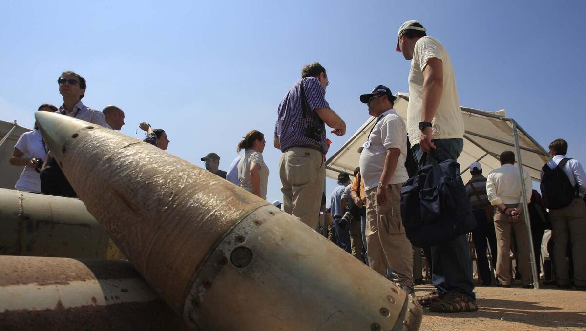 Activists and international delegations stand next to cluster bomb units in Lebanon in 2011 (Mohammed Zaatari/AP) Activists and international delegations stand next to cluster bomb units in Lebanon in 2011 (Mohammed Zaatari/AP)